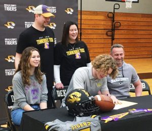 Outstanding DCHS Tiger Football Senior Isaac Knowles signed a letter of intent Wednesday, February 2 with Tennessee Tech University to play for the Golden Eagles starting next year. He was joined at the signing at DCHS by Tiger Coach Steve Trapp and his family including sister, Katherine, father Jared, and mother Karen Knowles pictured here