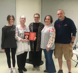 The Smithville Mayor and Aldermen paid tribute to the late Wallace Dale Caldwell, a 17 year veteran and Chaplain of the Smithville Volunteer Fire Department who passed away in November. Mayor Josh Miller presented a plaque to Caldwell’s wife, Carolyn as a way of honoring him and his years of service to the City of Smithville. Caldwell’s daughters Kitty Thomas and Tiffany Caldwell, son-in-law Tony Thomas, and granddaughter Carly Thomas were also present for the tribute. (Pictured left to right: Carly Thomas, Carolyn Caldwell, Kitty Thomas, Tiffany Caldwell, and Tony Thomas)