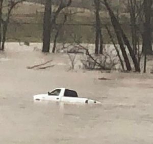 A man trapped in his pickup truck near Dowelltown due to rising flood waters from Smith Fork Creek has the DeKalb County Swiftwater Rescue Task Force to thank for coming to his aid