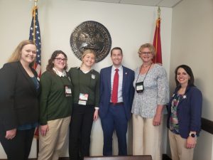 Mykaela Young, Alyssa Crook, Tess Barton, Mary Ann Puckett, and Leigh Fuson visit with Rep. Clark Boyd (center) during State 4-H Congress.