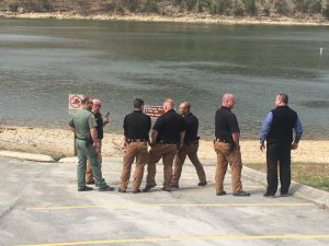 Members of the DeKalb County Sheriff’s Department and TWRA near the scene where a body was found floating face down in Center Hill Lake this (Wednesday) afternoon at the Johnson’s Chapel Recreation area
