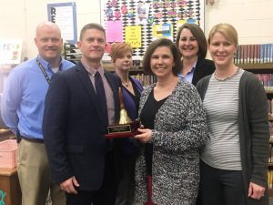 The 2022 DeKalb County School District Teacher of the Year is Amanda Mullinax, a librarian and media specialist at DeKalb West School. Mullinax got a surprise visit to her classroom in April for the “John Isabell Memorial Award” presentation by Director of Schools Patrick Cripps, DeKalb West School Principal Sabrina Farler, Assistant Principal Joey Agee, Supervisor of Instruction Michelle Burklow and Federal Programs Supervisor Dr. Danielle Collins. As part of the honor, Mullinax also received a school bell award, a floral arrangement, dinner gift card, and a certificate granting her a day off from school.