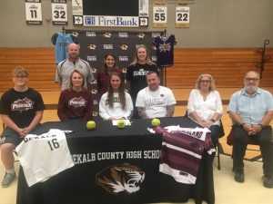 During a brief event Thursday at DCHS, Senior Tigerette Softball Star Jacey Hatfield signed with Cumberland University to further her education and to play softball for the Phoenix. Pictured here seated left to right are Aaron Hatfield (brother), Jennifer Hatfield (mother), Jacey Hatfield, Jeremy Hatfield (father), and Karen and Thomas Hatfield (grandparents). Backrow standing left to right: DCHS Tigerette Softball Coach Danny Fish, Cumberland Phoenix Head Softball Coach Stephanie Theall, and DCHS Assistant Coach Danielle Tyson Horton
