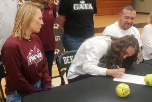During a brief event Thursday at DCHS, Senior Tigerette Softball Star Jacey Hatfield signed with Cumberland University to further her education and to play softball for the Phoenix. Pictured here looking on are her proud parents Jeremy and Jennifer Hatfield
