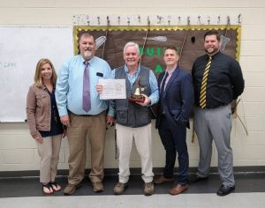 The 2022 DeKalb County High School Teacher of the Year is Gary Caplinger, a CTE residential and commercial construction teacher. Pictured left to right: DCHS Assistant Principal Jenny Norris, DCHS Principal Bruce Curtis, DCHS Teacher of the Year Gary Caplinger, Director of Schools Patrick Cripps, and DCHS Assistant Principal Thomas Cagle