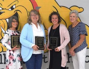 DWS Teachers Retire: Pictured left to right are Jalene Vanatta, Vicki Wilson, Martha Damron, and former cafeteria manager and kitchen worker Beverly Starnes