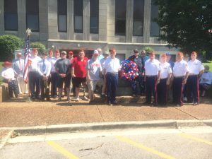 Local veterans and others gathered around the veterans memorial monument at the courthouse to place a wreath in remembrance of all those who have made the ultimate sacrifice for America’s freedom at the conclusion of Monday’s brief Memorial Day Program downtown.