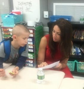 Tennessee Education Commissioner Dr. Penny Schwinn visited Smithville Elementary School in June as a part of the ‘Accelerating TN 2022 Tour.’where she met with administrators, teachers and students including this first grader