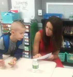 Tennessee Education Commissioner Dr. Penny Schwinn visited Smithville Elementary School in June as a part of the ‘Accelerating TN 2022 Tour.’where she met with administrators, teachers and students including this first grader
