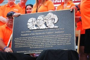 The James G. “Bobo” Driver family unveiled a marker during the Fiddlers Jamboree Saturday to be placed on the courthouse grounds commemorating three founders of the Jamboree in 1972 including Mr. Driver, Berry C. Williams, and Congressman Joe L. Evins, all of whom passed away many years ago