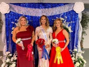 21-year-old Carly Breana Tipton of Smithville (center) was crowned the first ever Miss Fair Queen Monday night at the DeKalb County Fair. She was also named Miss Congeniality. This pageant featured three young women in the contest for those ages 21-54. First runner-up in the pageant was 21-year-old Abigail Hope Taylor (left) and 22-year-old Erica Paige Hatfield (right) was second runner-up. Taylor was also awarded for Most Photogenic.