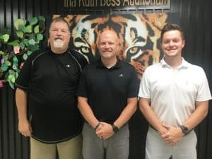 Joey Agee (center) Named DCHS Boys Basketball Coach while Cody Randolph (right) will be his Assistant Coach. DCHS Principal Bruce Curtis (left) made the announcement in July