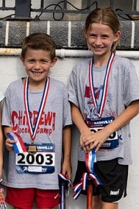 2022 Fiddler Fun Run Overall Champions Anna Swafford - 00:07:44 (right) Silas Richardson - 00:08:02 (left) (Photo by Luton’s Media)