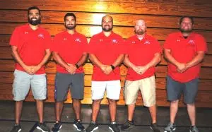 SAINTS FOOTBALL COACHES JUSTIN POTEETE, ETHAN VANHOOK, HUNTER POTEETE, TAD WEBB, AND JACOB HALE