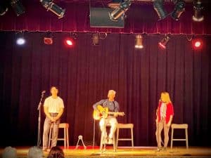 Aaron Tippin with his wife Thea and son Tom performing at Sunday's 9/11 memorial program at County Complex Auditorium