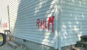 Graffiti spray painted on exterior walls of Bethlehem Community Church on Dry Creek Road