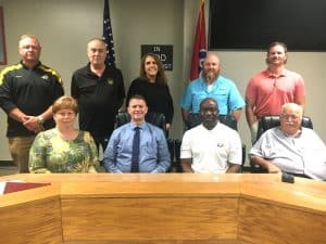 DeKalb Board of Education: Pictured seated left to right: Secretary Jamie Vickers, Director of Schools Patrick Cripps, Shaun Tubbs and Danny Parkerson. Back row standing left to right: Jim Beshearse, Alan Hayes, Jamie Cripps, Eric Ervin, and Jason Miller.