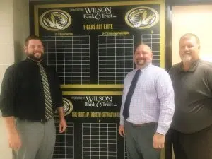 DeKalb County High School has found a new way to promote student achievement with help from two local sponsor partners, FirstBank and Wilson Bank & Trust. New signs are now prominently displayed on the wall in the hallway of the school near the office to highlight the names of students who have met various academic and vocational benchmarks. Pictured here left to right are DCHS Assistant Principal Thomas Cagle, Alex Woodward of Wilson Bank & Trust, and DCHS Principal Bruce Curtis