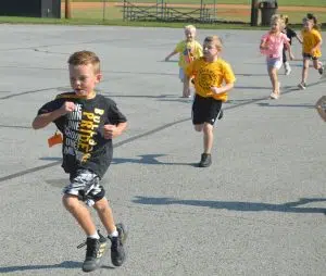 DeKalb West School students laced up their running shoes for the “Run for the Dogs” school fundraiser Friday