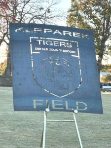 The unveiling of a sign (yet to be completed) that will be displayed at the entrance to DCHS Tiger and Lady Tiger Soccer Field designating it as the 