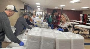 Volunteers prepared meals for delivery to the needy and underserved Thanksgiving morning on behalf of the DeKalb Emergency Services Association