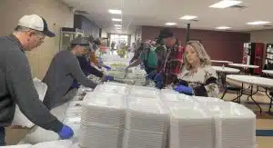 Volunteers prepared meals for delivery to the needy and underserved Thanksgiving morning on behalf of the DeKalb Emergency Services Association