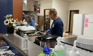 It all starts in the kitchen! volunteers helped prepare Thanksgiving Day meals for the needy and underserved on behalf of the DeKalb Emergency Services Association.