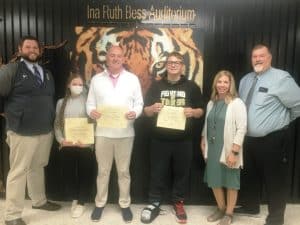 DeKalb County High School continued its monthly observance Thursday of recognizing a teacher, student, and parent or guardian of the month: Pictured here left to right are Assistant DCHS Principal Thomas Cagle; Hailey Hendrixson, a 17 year old Senior at DCHS who wrote a winning essay in tribute to her parents Doug and Richelle Hendrixson; Teacher of the Month Luke Dycus; Student of the Month, 17 year old Senior Isaac Sasser, Assistant DCHS Principal Jenny Norris; and DCHS Principal Bruce Curtis.