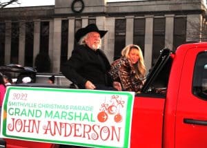 Country music legend John Anderson was the Grand Marshal of the Smithville Christmas Parade Saturday. Shown here with his wife Jamie