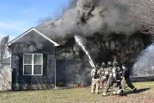 Smithville Firefighters battled a fire at 201 Hayes Street December 27 where the body of 37 year old Brittany Schemmer was found inside. She apparently died from smoke inhalation. (Chris Tramel Photo)