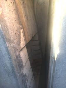The cornerstone on the bottom of the southwest end of the courthouse has a removable concrete cover dated 1970 on its exterior with a hollowed-out space inside the cover (as shown here) in the exact dimensions of the time capsule