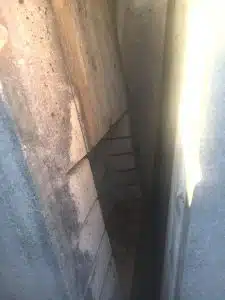 The cornerstone on the bottom of the southwest end of the courthouse has a removable concrete cover dated 1970 on its exterior with a hollowed-out space inside the cover (as shown here) in the exact dimensions of the time capsule