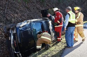 Two people were injured in a rollover crash Friday afternoon on Highway 70 east just north of Old Sligo Road. (Chris Tramel Photo)