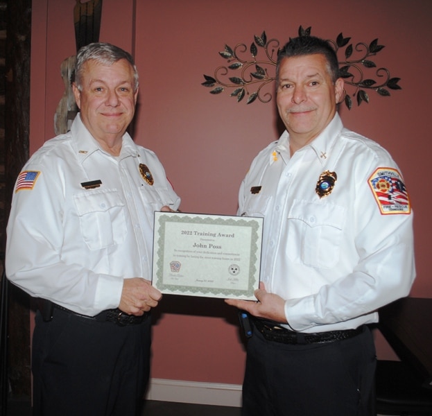 A Smithville Fire Department Training Award has been presented to a strictly volunteer city firefighter and Captain John Poss (right) received the honor Monday night during an appreciation dinner for city firefighters at Ace’s Steakhouse, Seafood, and Italian Restaurant downtown. Captain Poss put in 128 hours of training as a volunteer during the year 2022. Chief Charlie Parker presented the award.