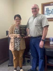 Smithville Electric System has honored its second longest tenured employee for her service to the utility. Vicky Snow was recently presented a 35 year service award from Smithville Electric System Manager Richie Knowles. “Vicky started her career with Smithville Electric System in 1987. She has been an excellent employee all of her career. Vicky started out reading meters and has served in several different roles throughout her tenure. She currently serves as the office manager for the electric system. Vicky is the second longest tenured employee of Smithville Electric. We appreciate her dedication and continued willingness to serve,” said SES Manager Knowles.