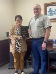 Smithville Electric System has honored its second longest tenured employee for her service to the utility. Vicky Snow was recently presented a 35 year service award from Smithville Electric System Manager Richie Knowles. “Vicky started her career with Smithville Electric System in 1987. She has been an excellent employee all of her career. Vicky started out reading meters and has served in several different roles throughout her tenure. She currently serves as the office manager for the electric system. Vicky is the second longest tenured employee of Smithville Electric. We appreciate her dedication and continued willingness to serve,” said SES Manager Knowles.