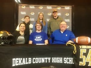 DCHS Tiger Football Senior Ean Jones was joined by members of his family Friday, February 3 at DCHS as he signed a letter of intent with Lindsey Wilson College in Columbia, Kentucky to continue his football career at the college level this fall. Pictured seated left to right are Teresa Jones, Ean Jones, and Chris Jones. Standing left to right are Eli Jones, Tess Barton, and Evan Jones.