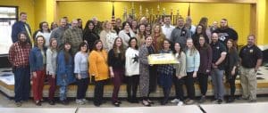 Cut the cake. It’s time to celebrate! Kudos to the students and staff at DeKalb County High School for recent academic growth. Staff at the school recently gathered for the celebration with the cutting of a cake. “DCHS was named a Level 4 out of a 5 school in growth for the 2021-22 school year. We are really excited about that growth. We had outstanding growth in Algebra II and English 10 at DCHS and I think that is what put us over the expected growth for the 2021-22 school year,” said Supervisor of Instruction Dr. Kathy Bryant