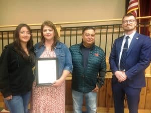 The County Commission Monday Night Recognized the Late Lance Cpl. Alberto Lucio by presenting a resolution in tribute to members of his family pictured here left to right: Sister Abigail Grace Lucio, Mother Nereyda C. Lucio and father Jose Alberto Lucio with County Mayor Matt Adcock
