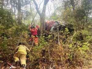 A 62-year-old man was injured in a bizarre crash Thursday morning when his car plunged off a steep bluff near Sligo Bridge. (DeKalb Fire Department Photo)