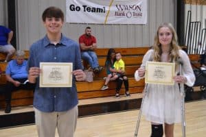 DWS 8th grade Homeroom teachers present the 4 PAWS Award. Pictured left to right are Chase Young and Emily Fry.