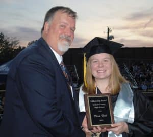 DCHS Principal Bruce Curtis presented the prestigious Citizenship Award to Dixie Hill during Friday night’s commencement ceremony