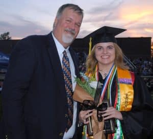 DCHS Principal Bruce Curtis presented the prestigious White Rose Award to Jacklyn Kleparek during Friday night’s commencement ceremony