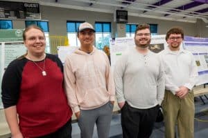 Tech students design database for Smithville Fiddlers' Jamboree. From left, Earl Pike, Sean Tyrer, David Miller and Christopher Mitchell present their work for the Smithville Fiddlers' Jamboree at Tennessee Tech's recent Senior Design Expo. Not pictured, teammate Destin Harris.