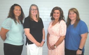 DCHS teacher Anita Puckett (SECOND FROM RIGHT) is returning to Smithville Elementary School where she will succeed Summer Cantrell who has resigned as Principal while DeKalb Middle School Assistant Principal Angela Johnson (SECOND FROM LEFT) is moving to Northside Elementary to become Principal with the departure of Karen Knowles. Meanwhile, DMS teacher Teresa Jones (FAR LEFT) has been promoted to the position of Assistant Principal at DMS to succeed Johnson while at SES, Karen France (FAR RIGHT), a DCHS educator will take over as Assistant Principal from Amanda Dakas, who has stepped down