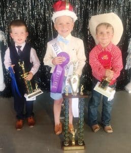 Bentlee John Myers (CENTER) was crowned Little Mister at the DeKalb County Fair Tuesday night. Myers is the 5 year old son of Crystal Stibil of Smithville. Myers was also awarded for being Most Photogenic. First runner-up was Samuel Keith Griffin (LEFT), 4 year old son of Luke and Casey Griffin of Alexandria. Tucker Cripps (RIGHT) was second runner-up. He is the 4 year old son of Tyler and Jessica Cripps of Alexandria.