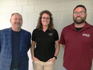 Mayor Josh Miller and Alderman Shawn Jacobs, the city’s representative on the airport advisory committee, welcome Chelsea Jones as the new manager of the Smithville Municipal Airport