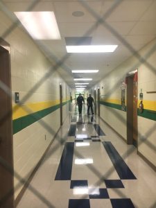 Local law enforcement officers conduct planned intruder drill at Northside Elementary School Thursday ensuring all classroom doors are locked during the drill