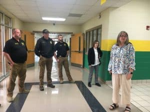 Northside Elementary School Principal Angela Johnson and Assistant Principal Beth Pafford meet with local law enforcement officers during intruder drill held Thursday at the school