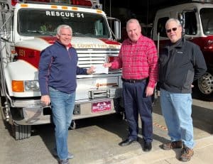The DeKalb Fire Inc. has been presented with a donation from the Mountain Harbour Property Owners’ Association (POA). Pictured are Brian Clark (left) and Pete Siggelko (right) of the Mountain Harbour Property Owners Association with Chief Green (middle).